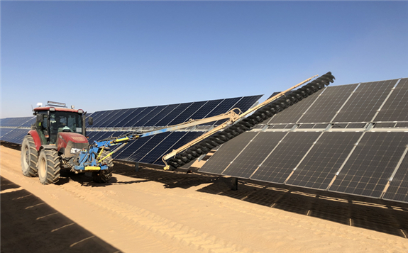 Picture 2: A SunBrush? mobil Compact removes sand from solar modules at the Benban solar park.